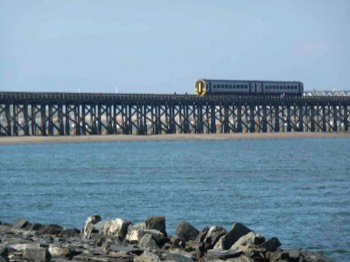  A Train Travelling Over Barmouth Bridge 